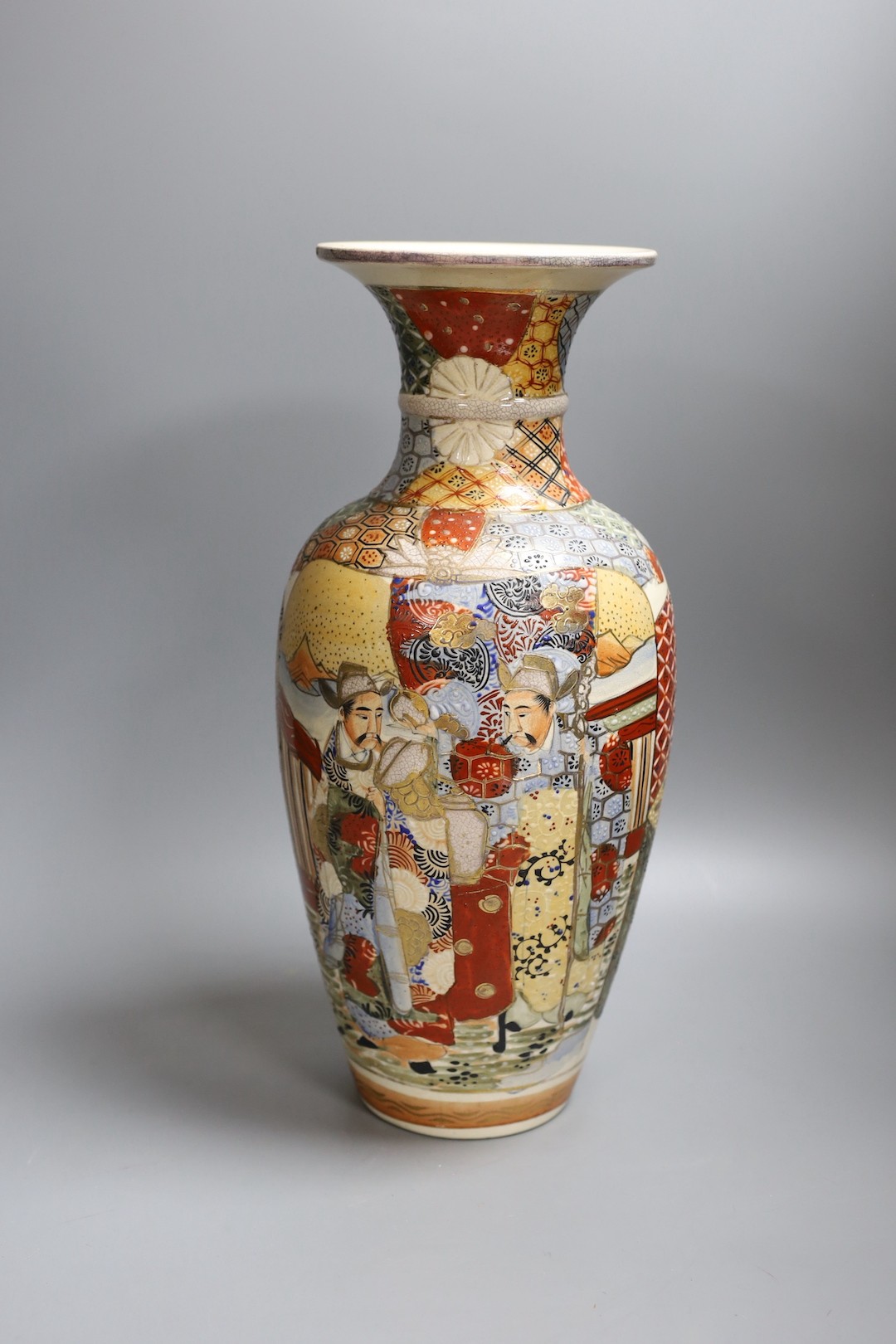 Japanese satsuma vase, 39cm high, together with a red Chinese vase and 19th century Chinese famille rose teapot